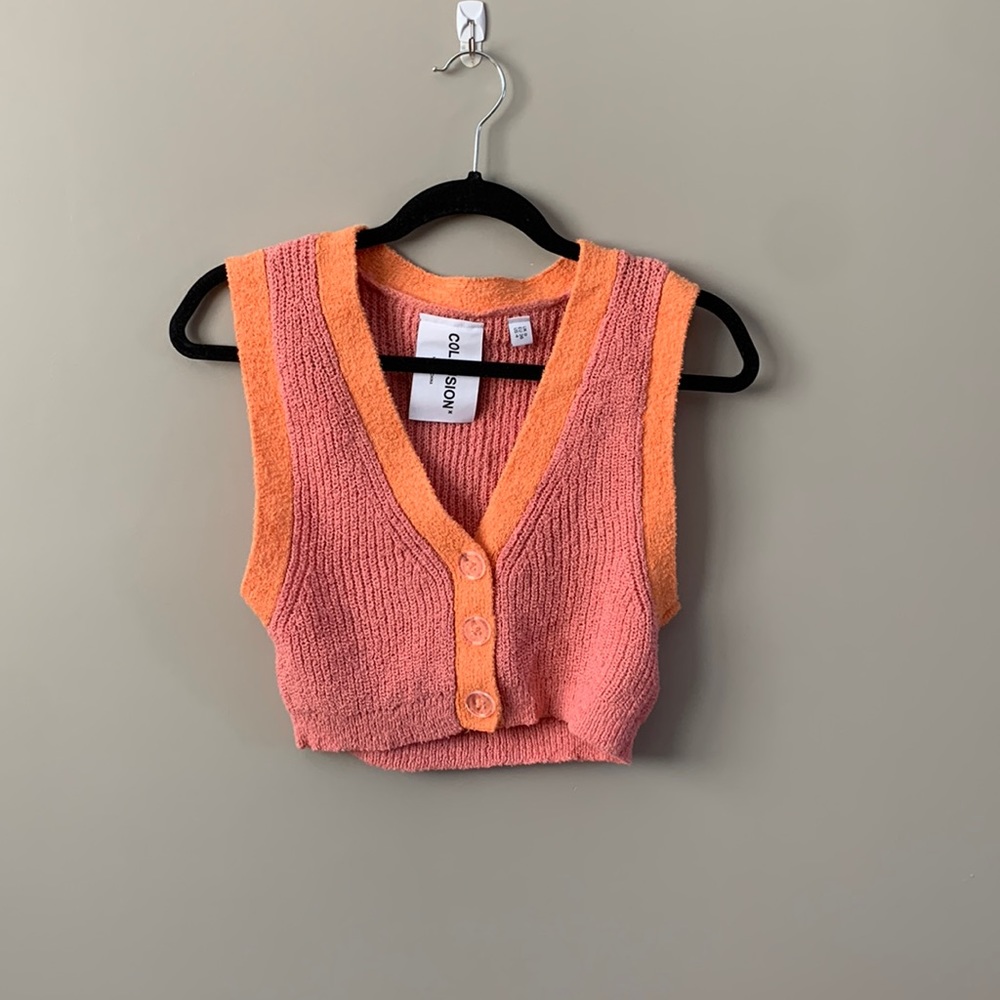 Cropped sweater tank with button detailing.